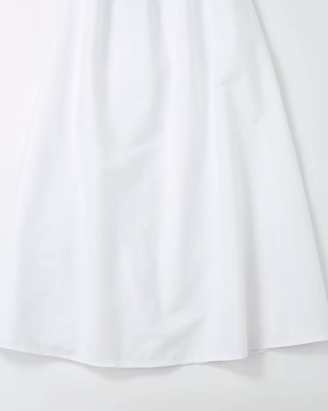 Witte Elegante Halterjurk met V Hals en Spaghettibandjes