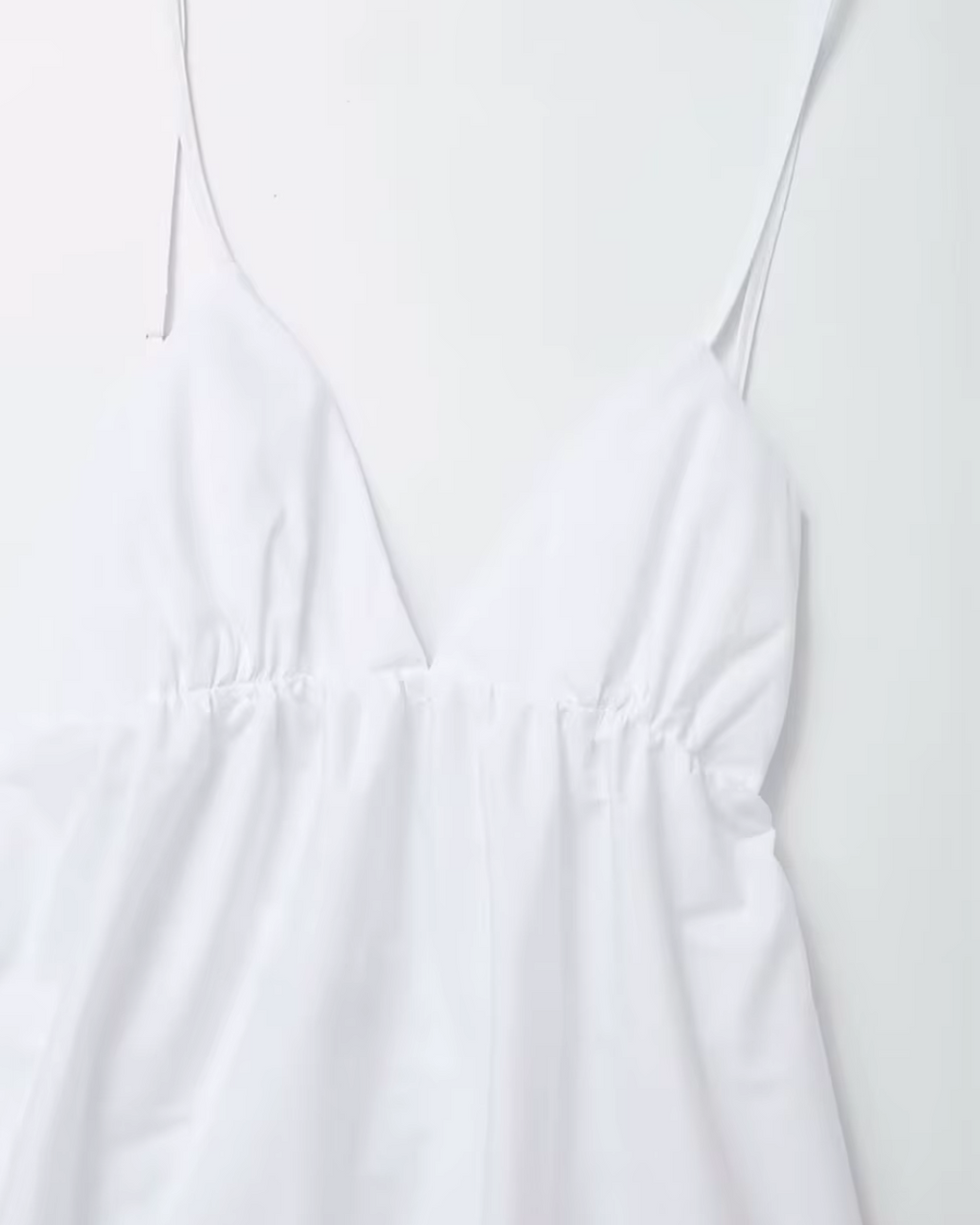 Witte Elegante Halterjurk met V Hals en Spaghettibandjes