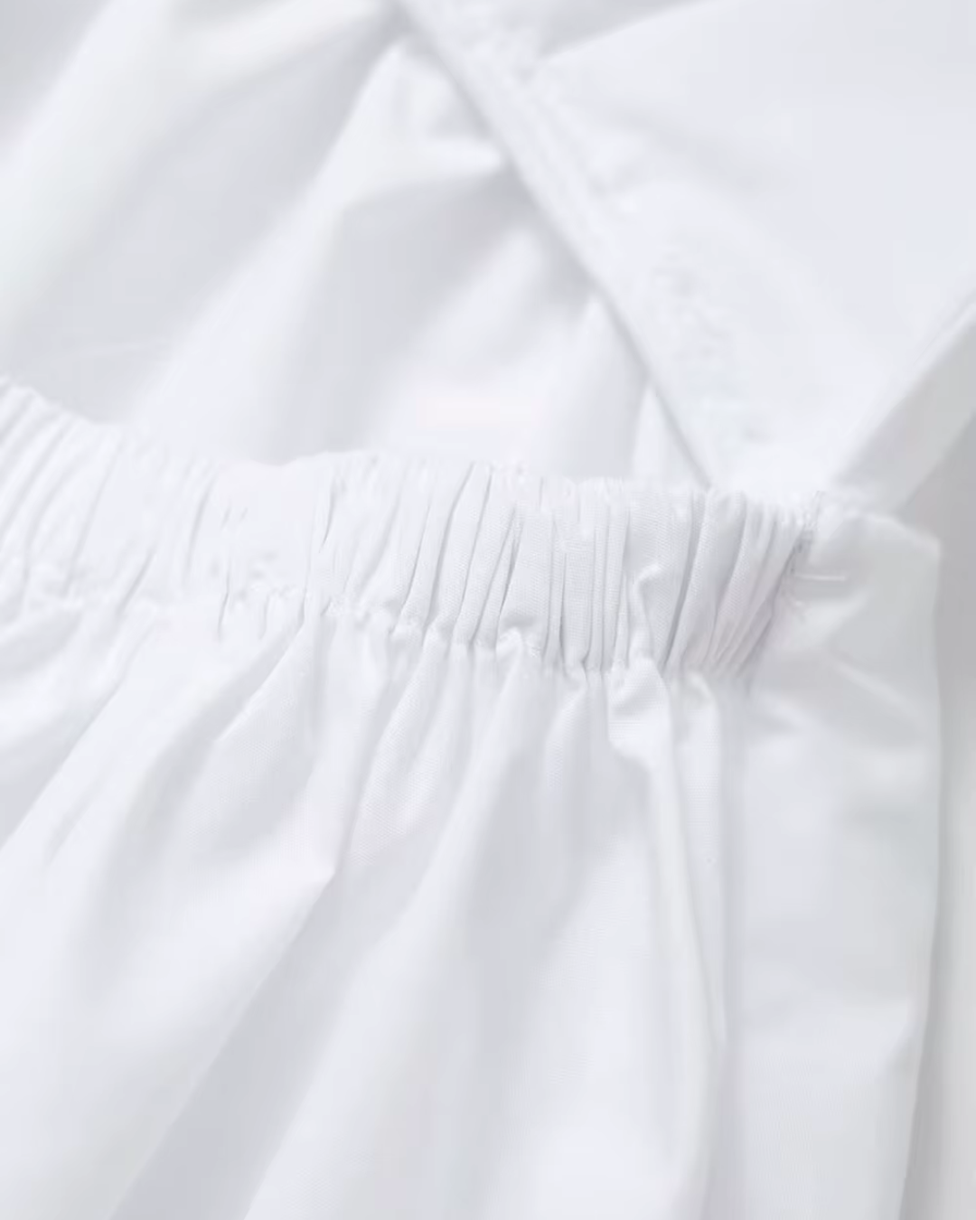 Witte Elegante Halterjurk met V Hals en Spaghettibandjes